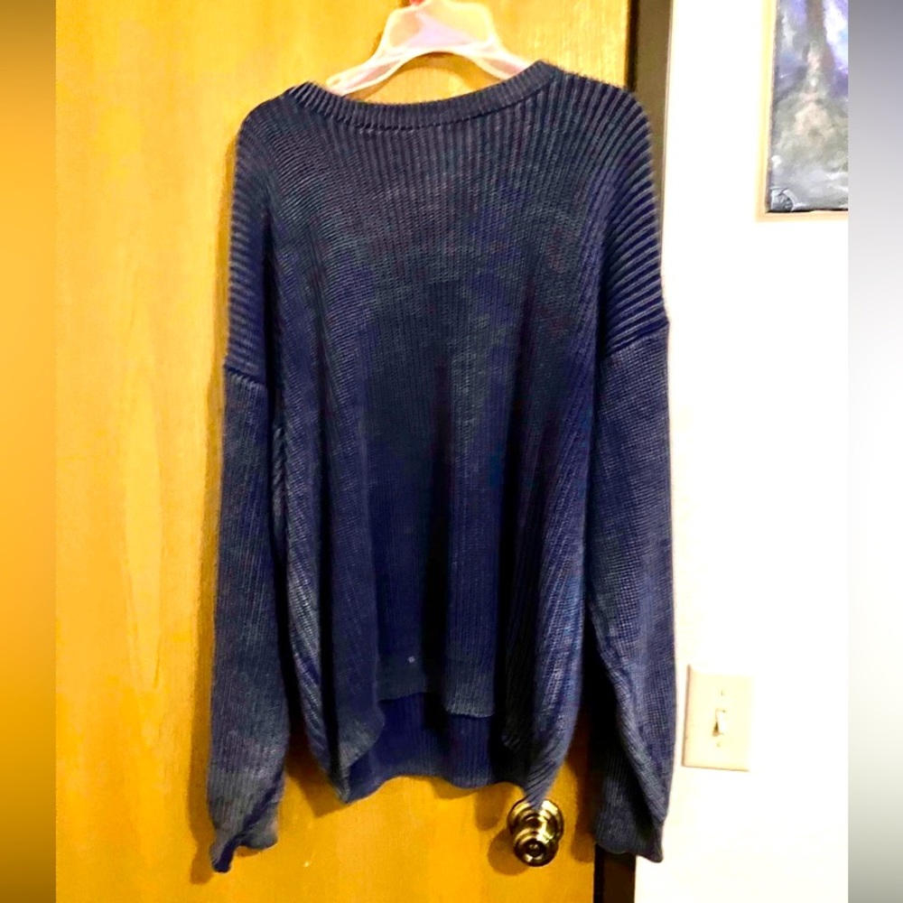 Size large men’s knit sweater. Blue color. Large and roomy and rarely ever worn